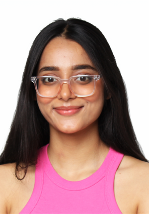 Ashween wearing glasses smiling towards camera