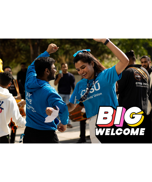 Big Welcome image: two students locking arms and dancing