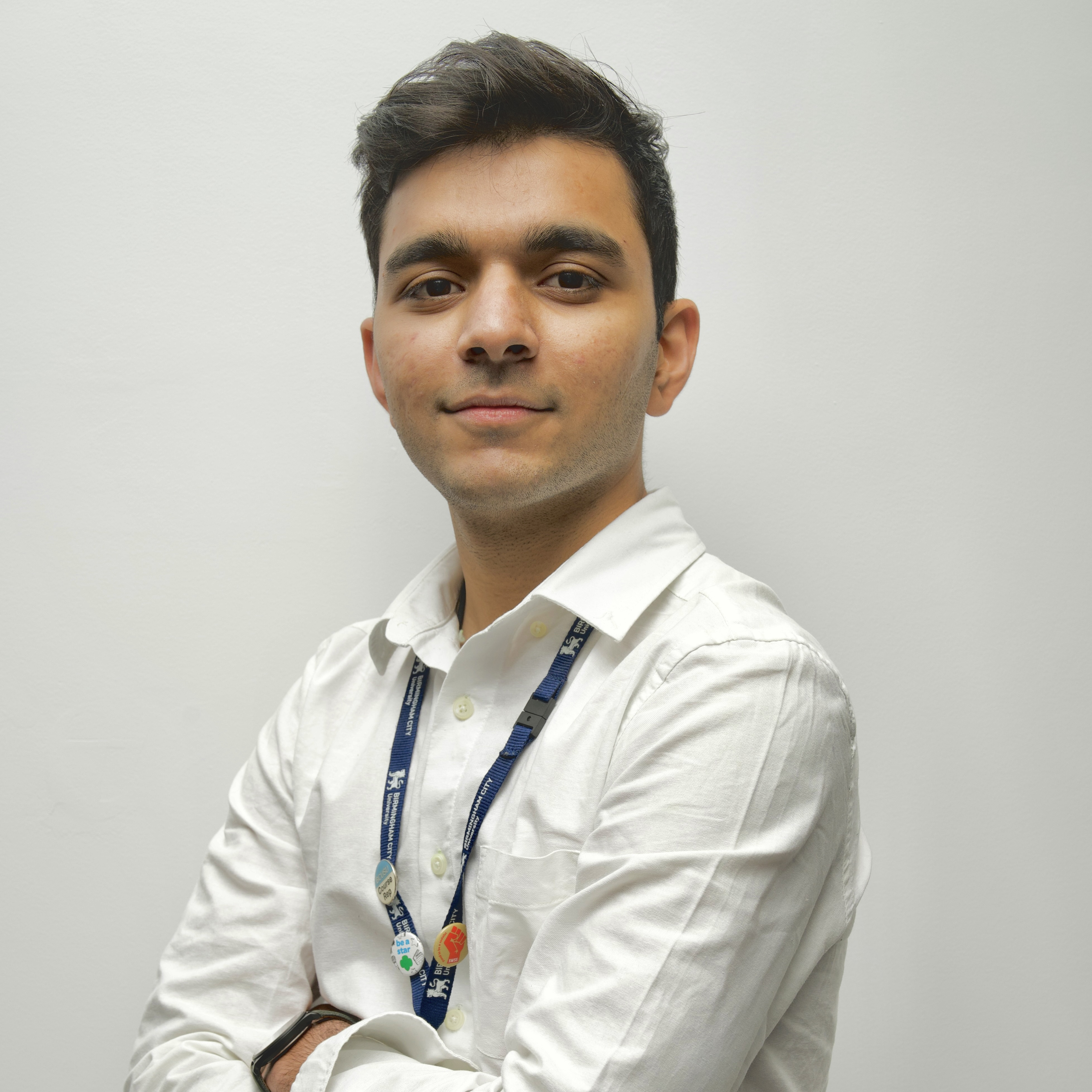 wahid posing with arms folded looking to camera