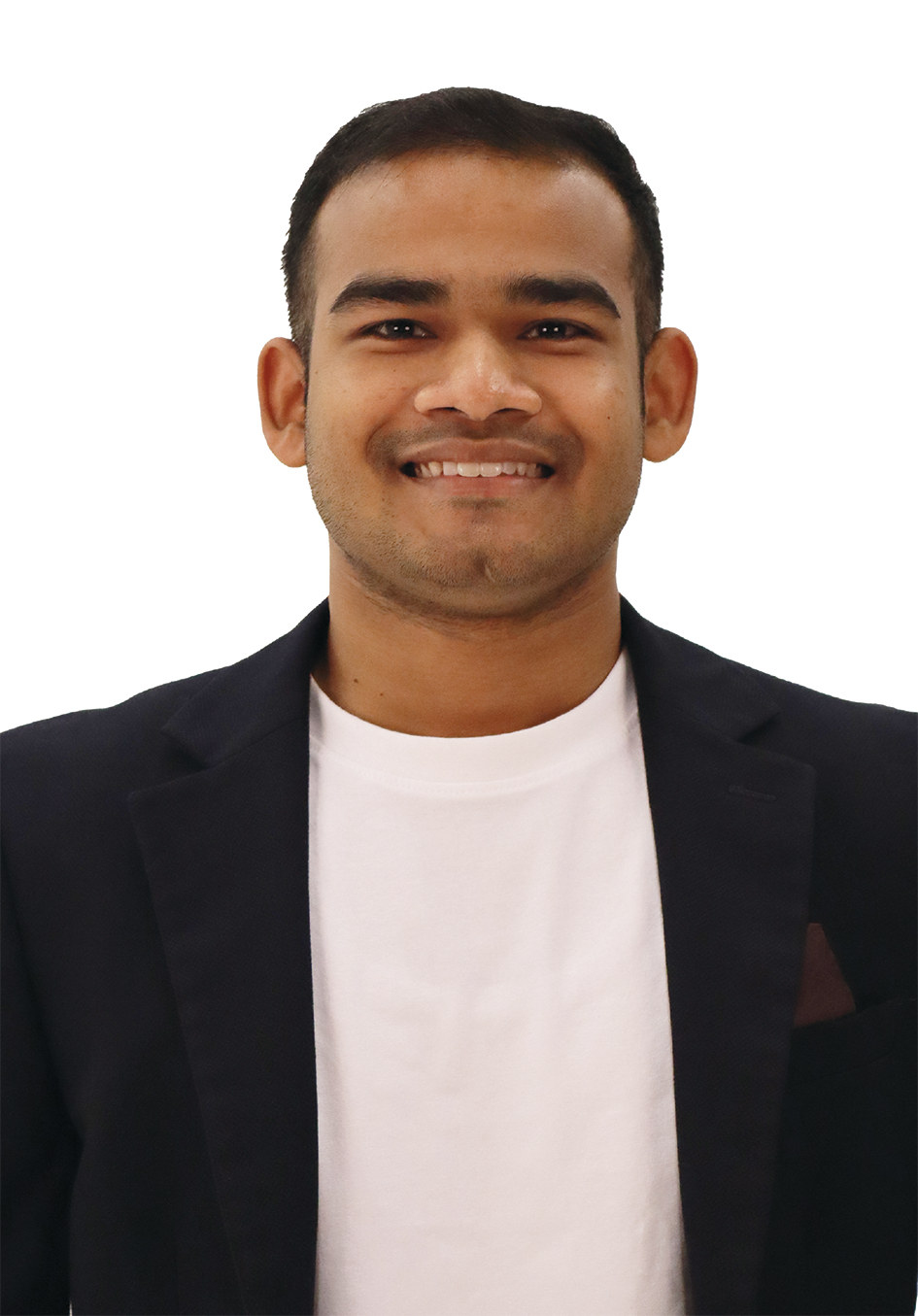 Craig is smiling wearing a black blazer with a white t-shirt