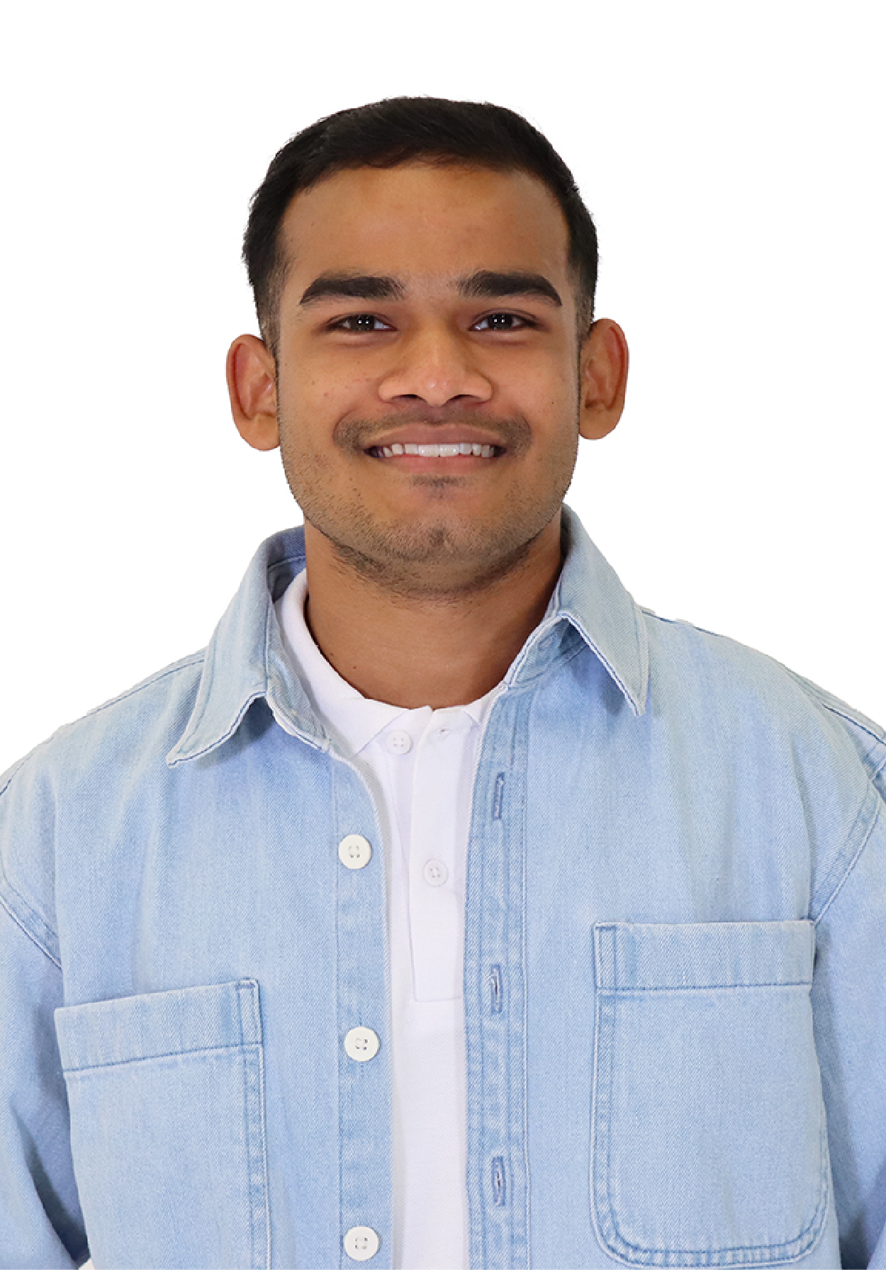 Craig in a blue shirt and white t-shirt smiling