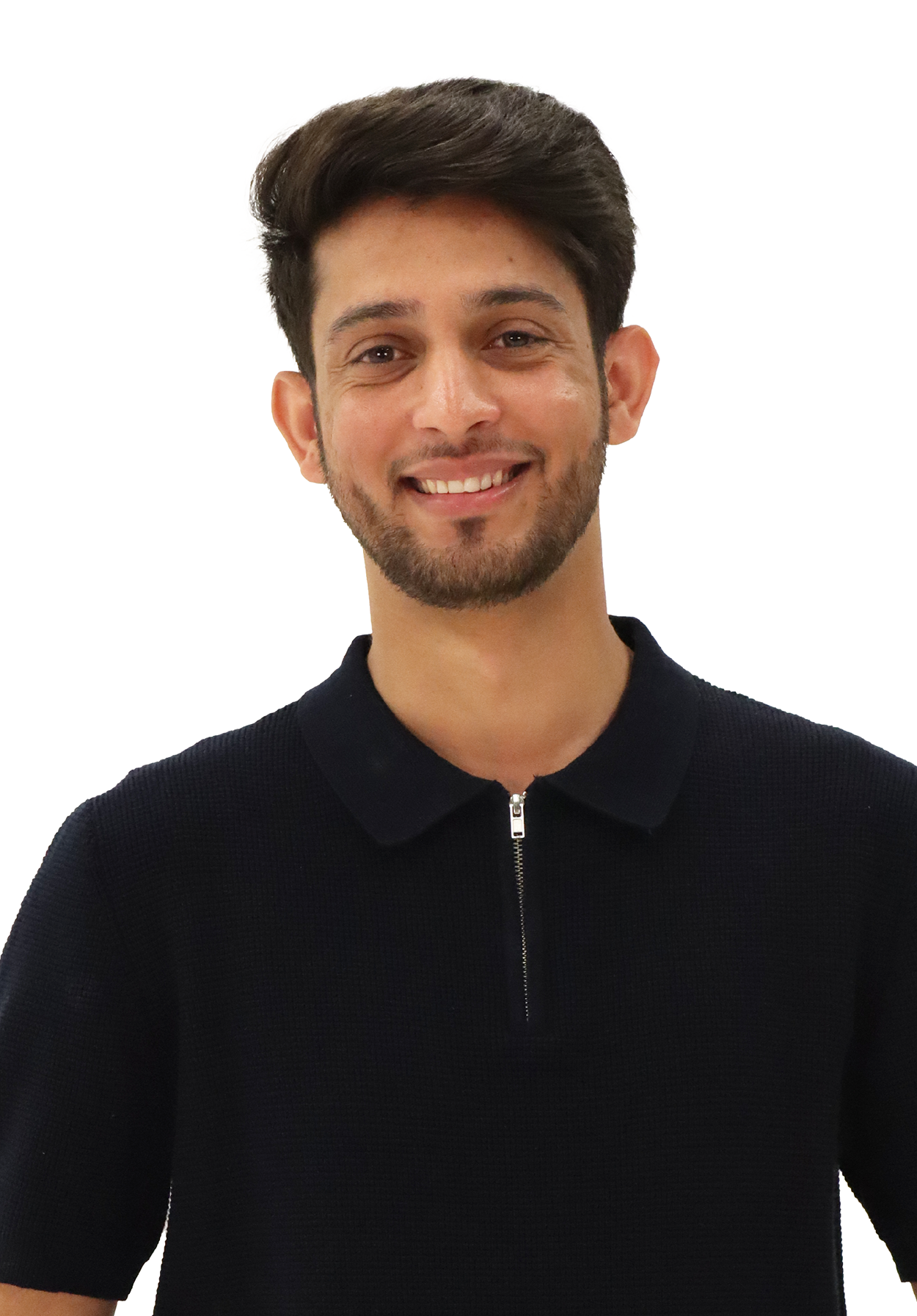 Syed is wearing a black quarter zip, has black hair and a beard and is smiling