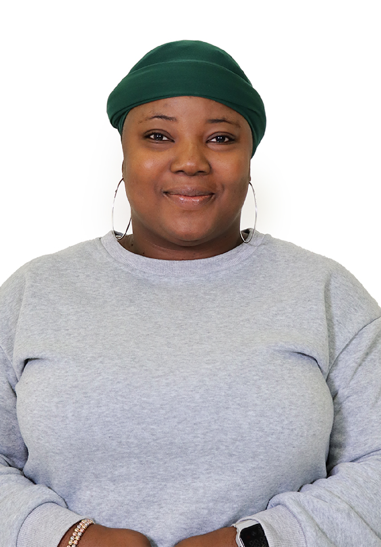 Oluwadamilola in a grey sweatshirt smiling